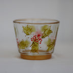 decorative tealight holder with hand painted berry and holly design